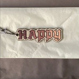 BNWT COACH x DISNEY “HAPPY” KEY CHAIN